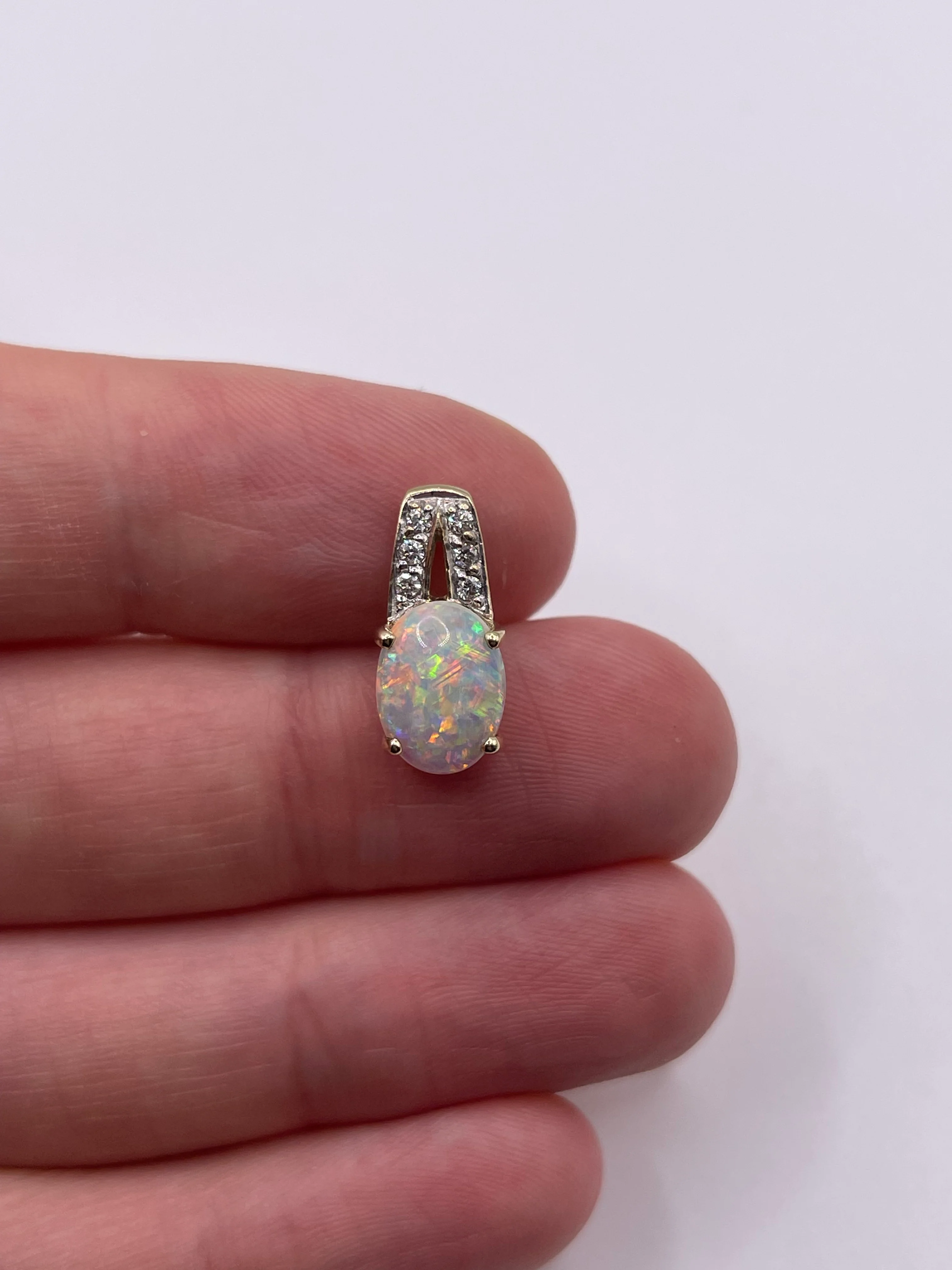 9ct gold opal and diamond pendant