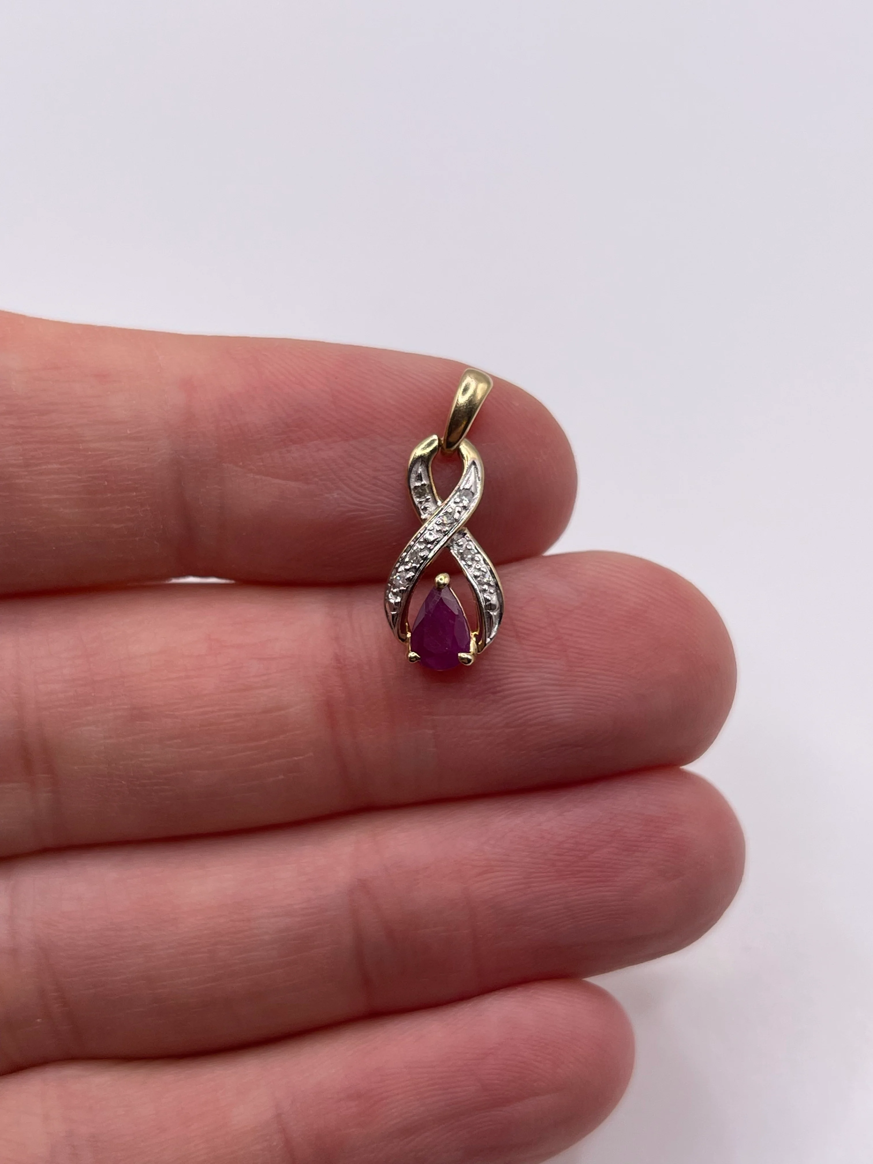 9ct gold ruby and diamond pendant
