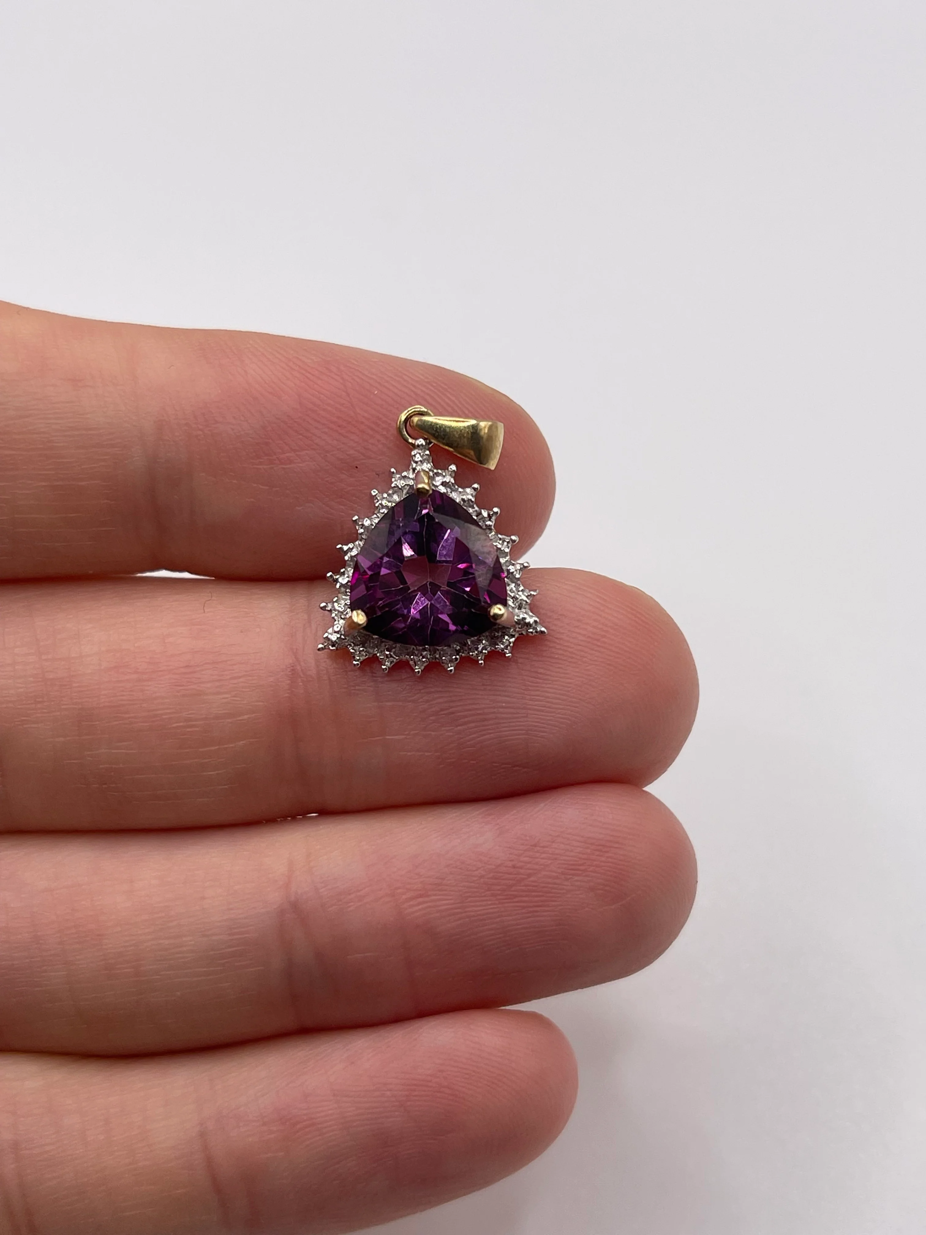 9ct gold topaz and diamond pendant